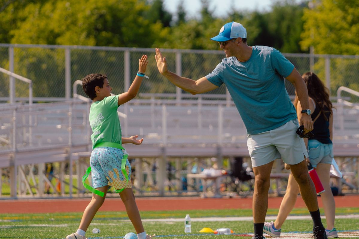 Players high-five after the game